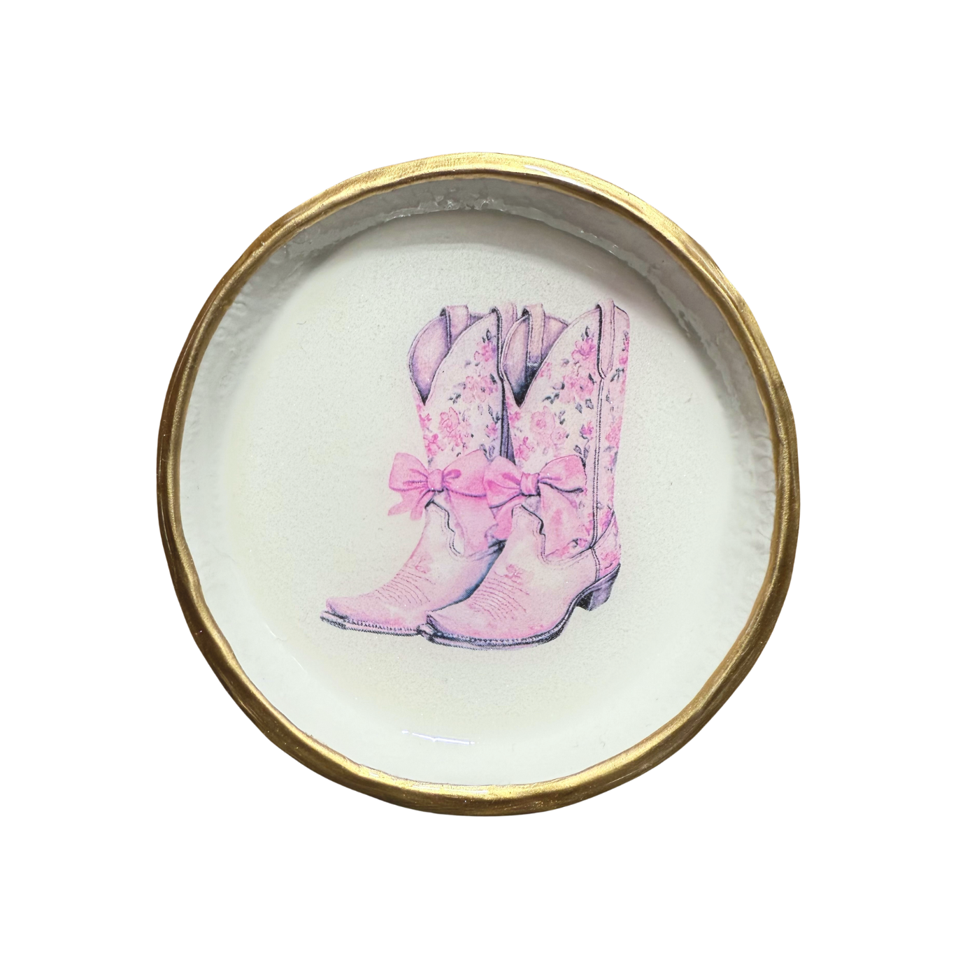 Round ceramic plate with pink cowboy boots and bows on a white background