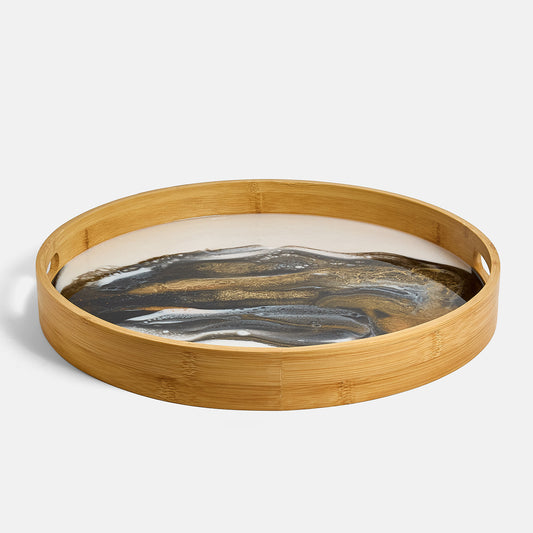 Round wooden tray with a decorative interior design on a white background