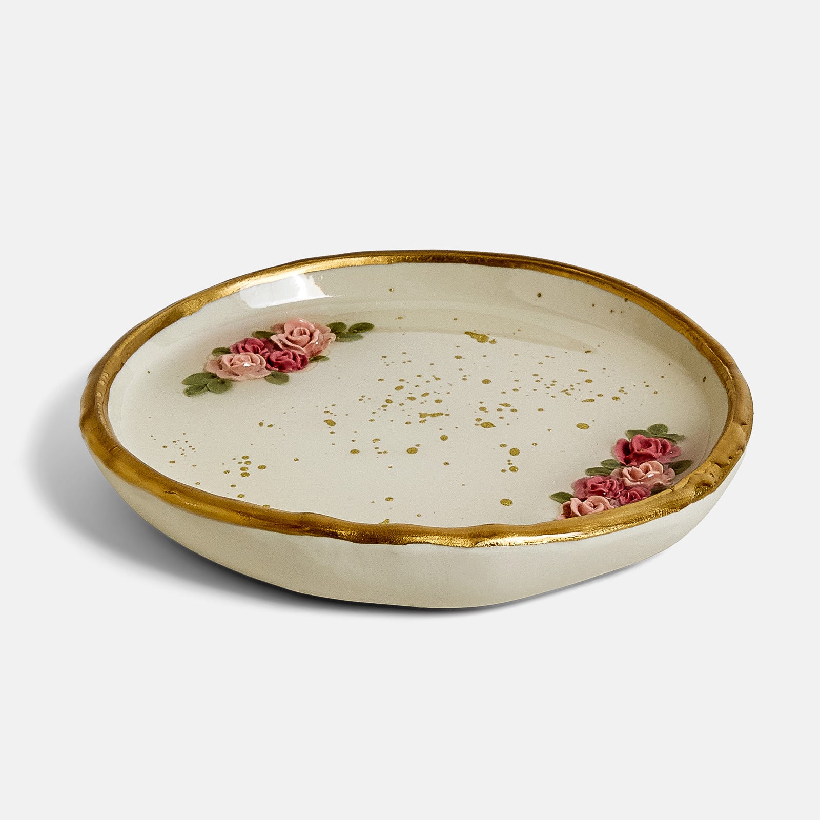 Ring dish with floral roses on a white background