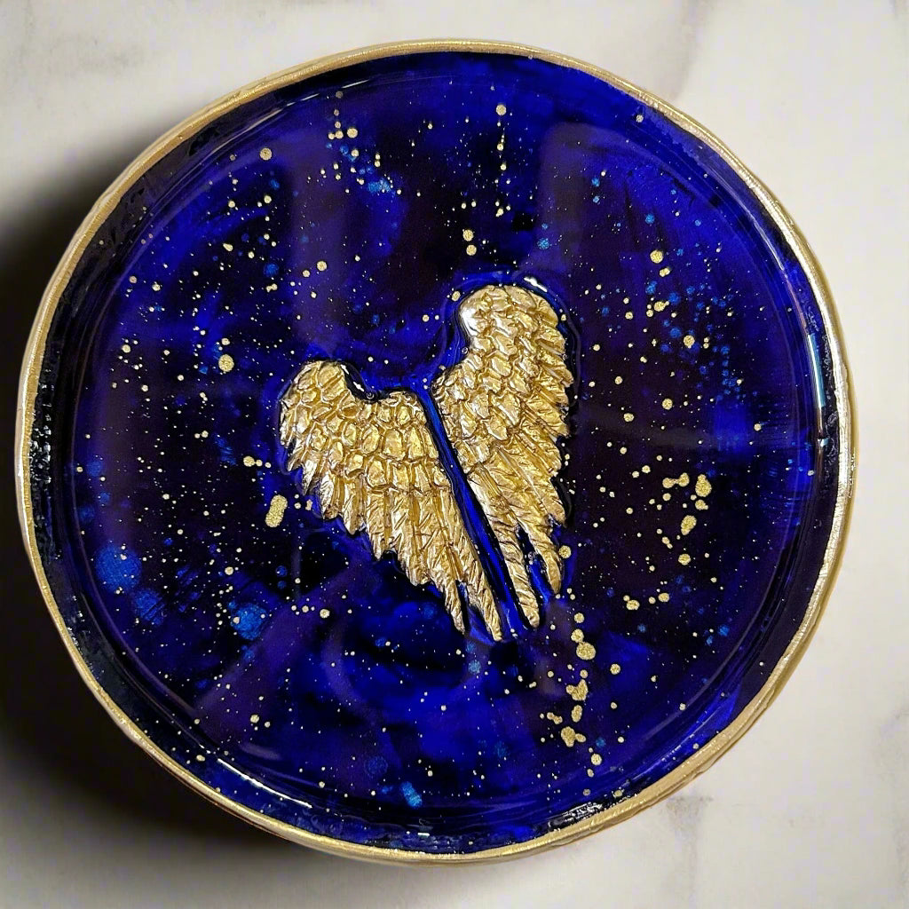 Gold angel wings on a blue ring dish - trinket tray - jewelry tray
