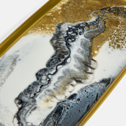 Marbled design with gold, black, and white on a rectangular surface