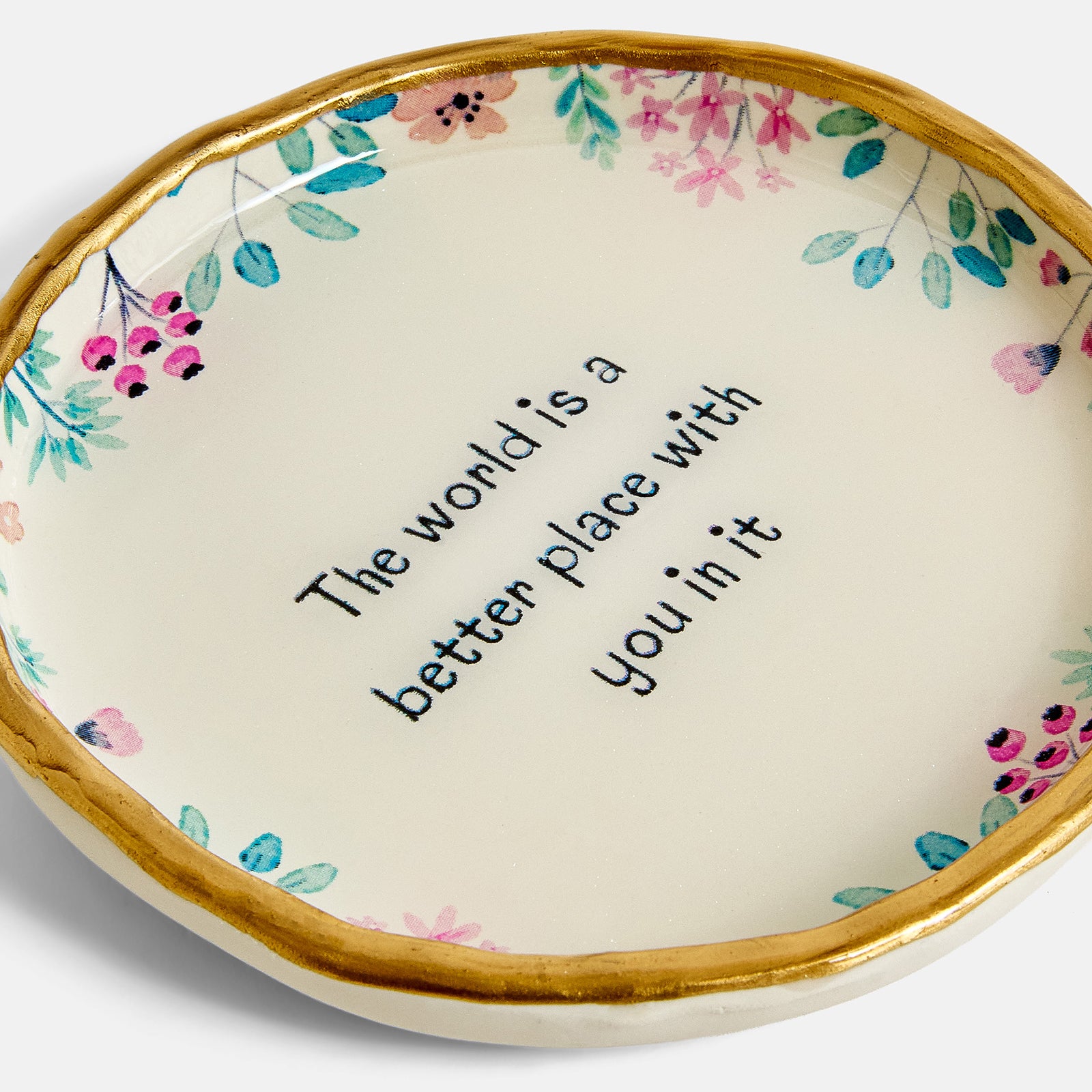 Decorative Ring Dish with floral design and motivational quote on a white background